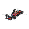 Scaleauto SC-6306 Formula 90-97 inline chassis with body removed, angled view